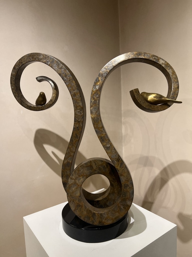 bronze swirl with two bronze birds